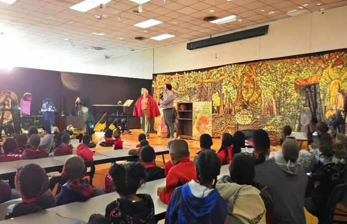  Detroit Opera House performers performing in front of the students